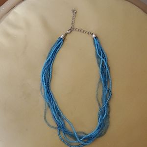 Turquoise colored beaded necklace